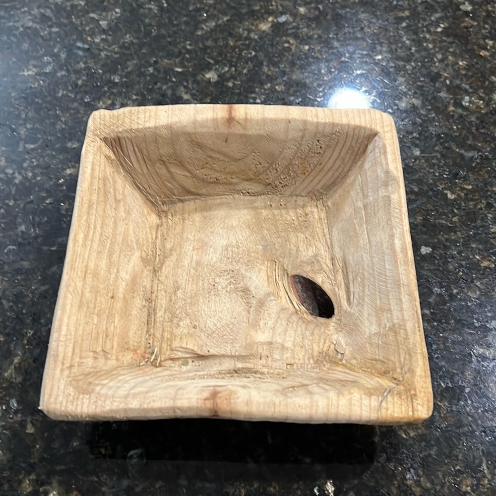 Small square wood bowl. Does have a hole through the bottom.